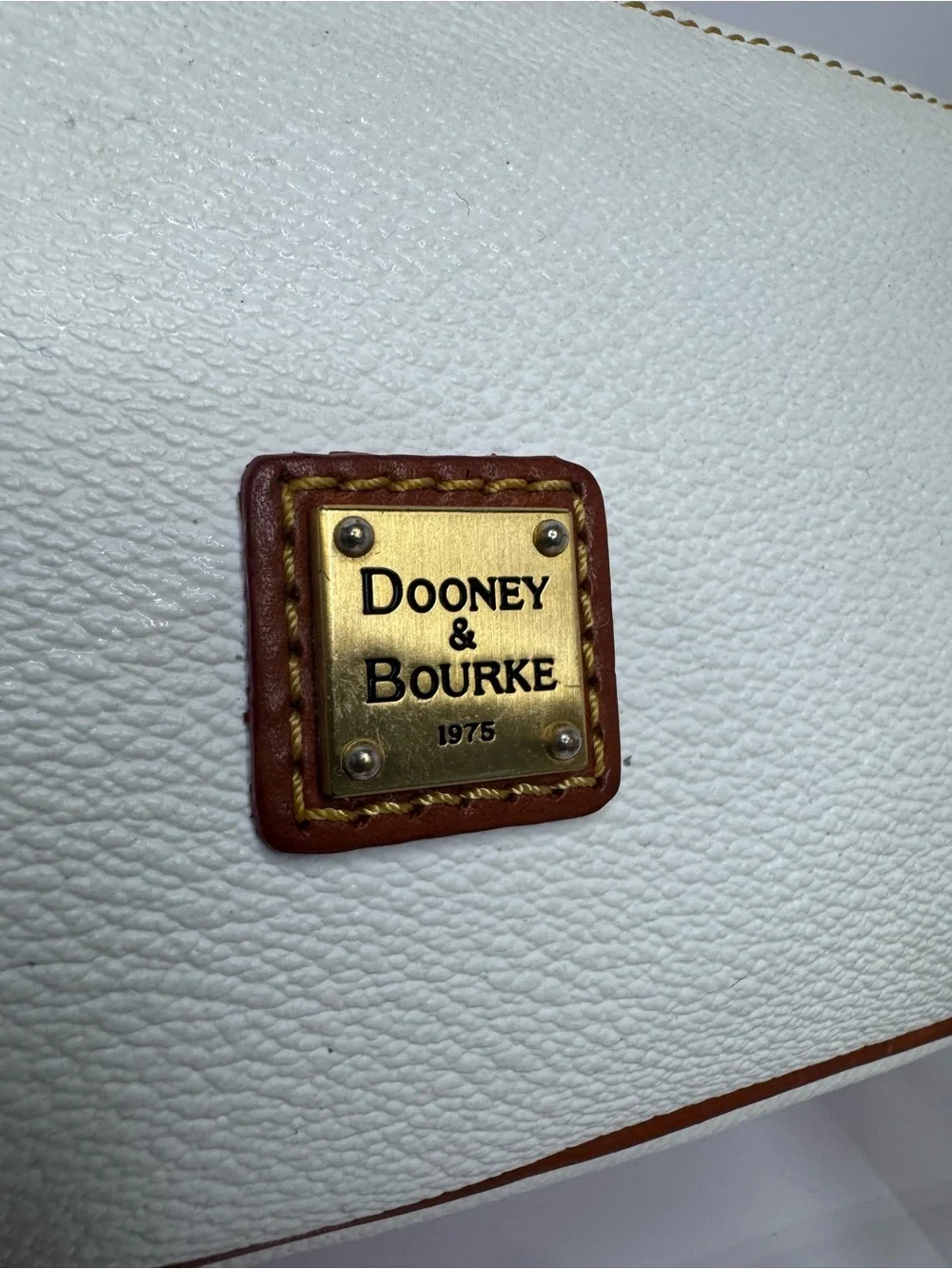 #380 Dooney & Bourke Lexi Small Pebbled Leather Crossbody Bag